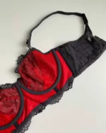 the-backside-of-a-tempting-black-and-red-lace-bustier-bra-without-foam-with-a-bow