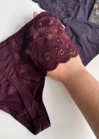 hand-is-holding-purple-lace-brazilian-panties-for-large-size