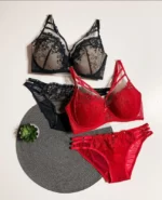 tempting-black-and-beige-and-red-sets-of-bras-and-panties-with-gentle-flower-pattern-mesh-and-belts-with-a-plant-nearby