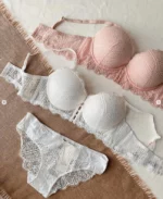 gentle-pink-and-white-sets-of-bustier-bras-with-small-push-up-and-panties-with-an-interesting-lace-pattern