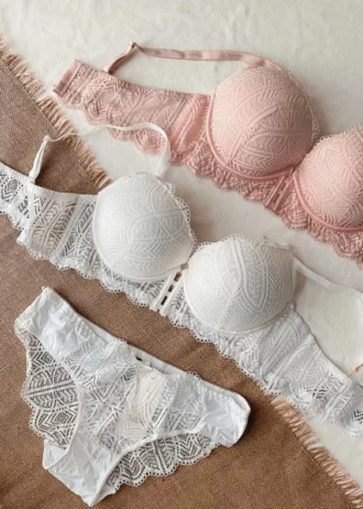 gentle-pink-and-white-sets-of-bustier-bras-with-small-push-up-and-panties-with-an-interesting-lace-pattern