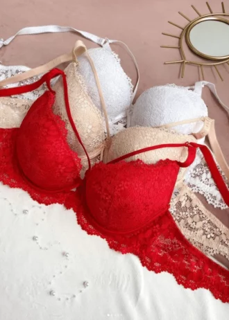 tempting-white-beige-and-red-lace-classic-bras-with-push-up-bows-and-belts-with-the-mirror-nearby