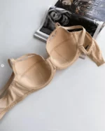 the-backside-of-a-beige-lace-bra-with-thin-foam-for-C-D-cups